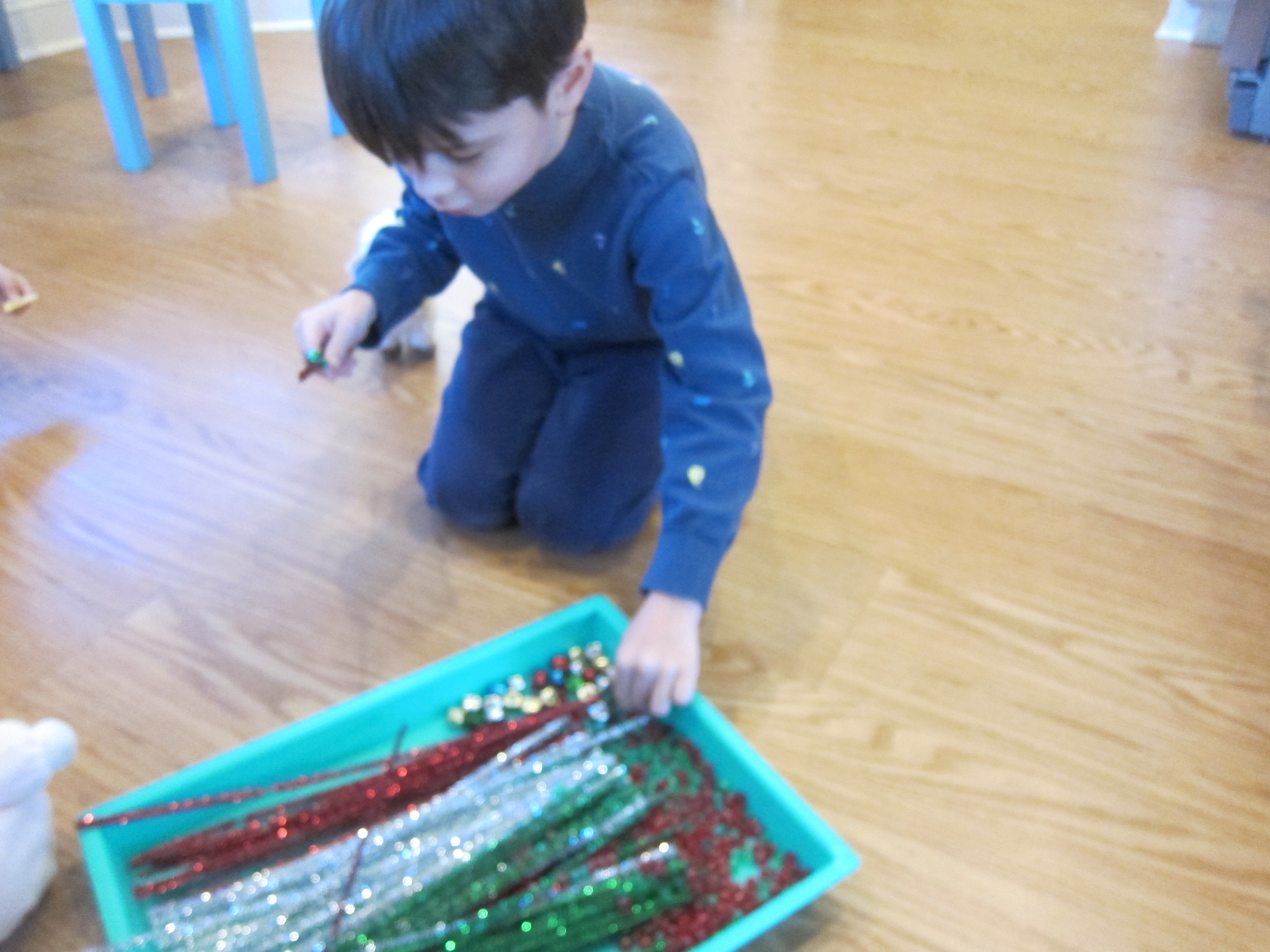 Threading Christmas Pipe Cleaners (2)