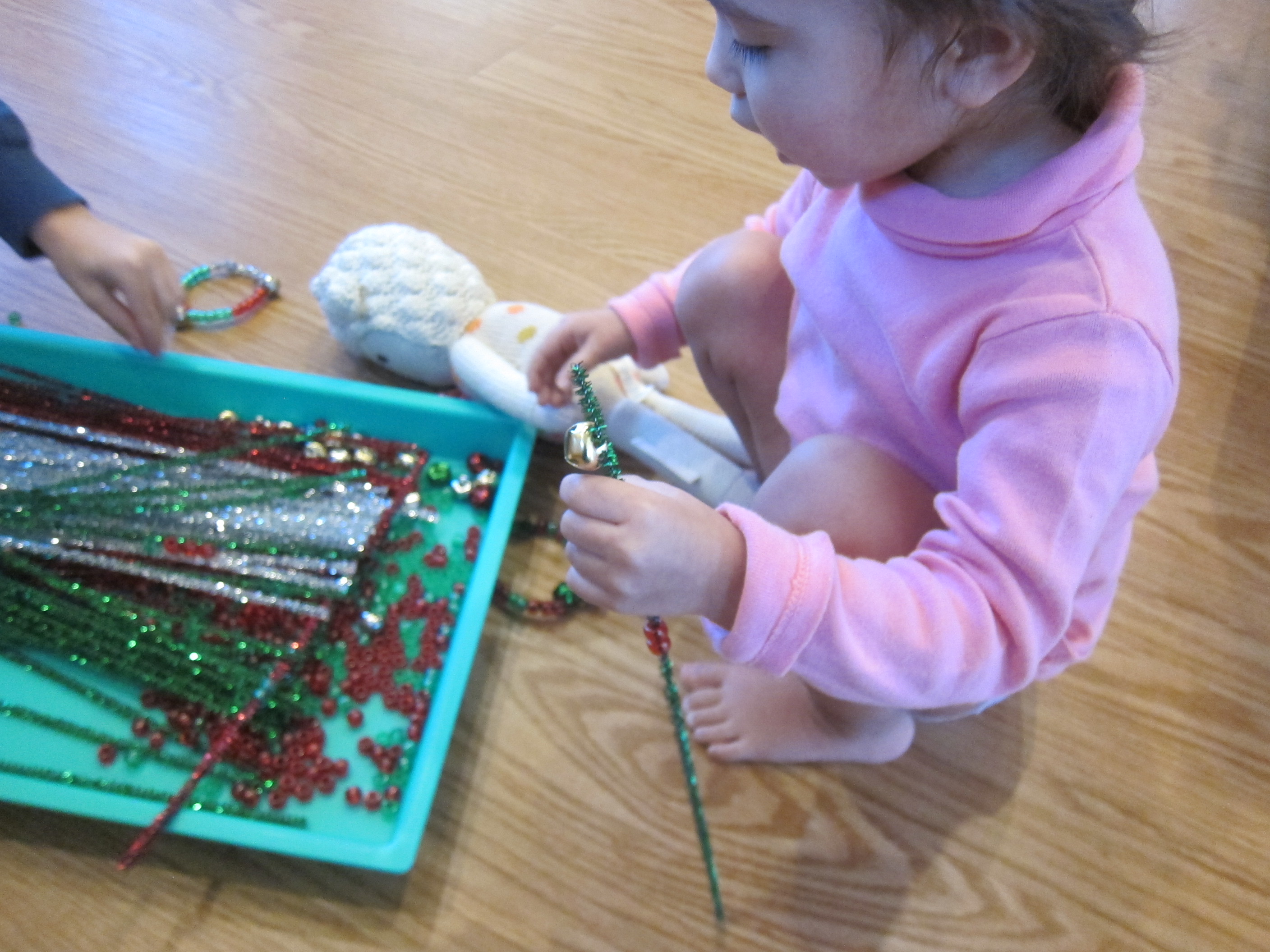 Threading Christmas Pipe Cleaners (9)